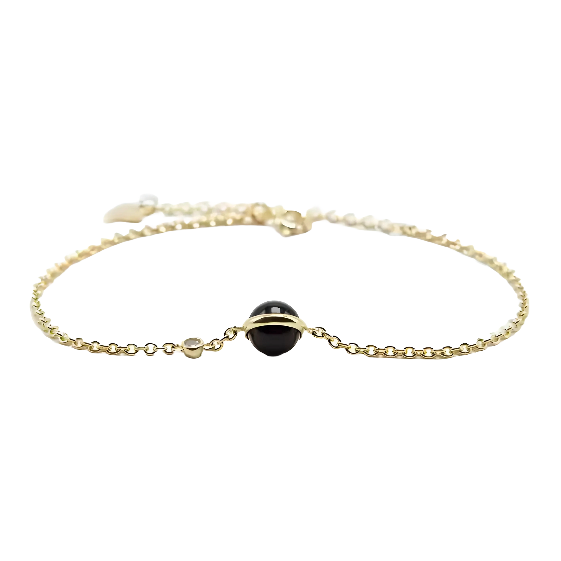 Delicate vergulde armband versierd met een zwarte agaatsteen, die diepe elegantie symboliseert