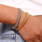Verfijnde gouden armband, die een vleugje tijdloze aantrekkingskracht biedt