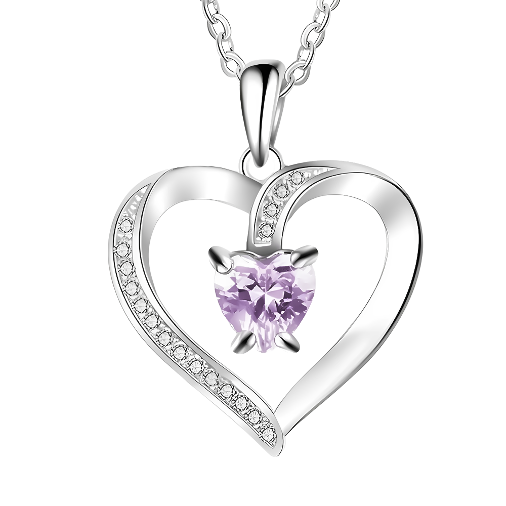 Zilveren ketting met een briljant paarse Swarovski-hart, die de diepte van ware emotie weerspiegelt.
