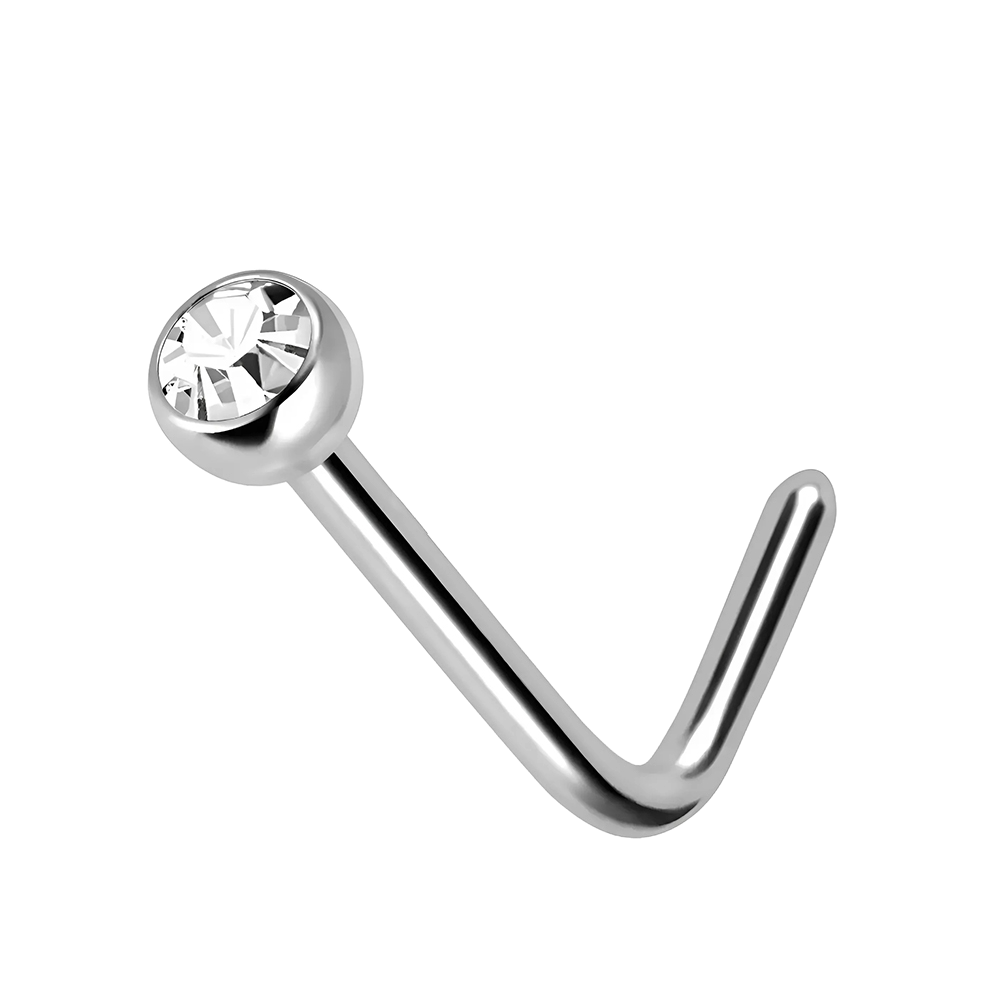 Een gepolijste titanium L-vormige pin met een 2mm heldere zirconia, werpt een delicate glinstering op het profiel van de drager