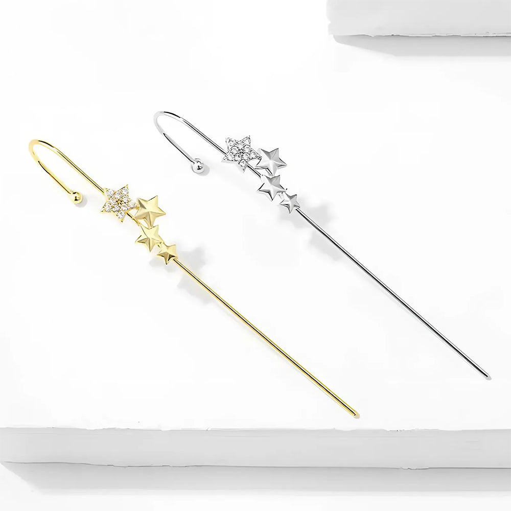 Een 14K gouden cuff sprankelt met moissaniet, een harmonieuze mix van luxe en gratie